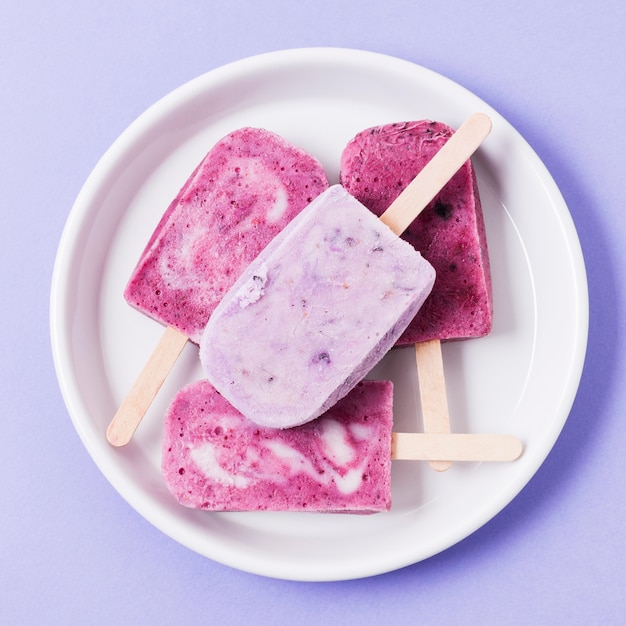 Ice cream sticks on plate