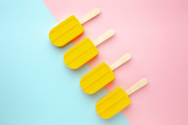 Ice creams aligned on table