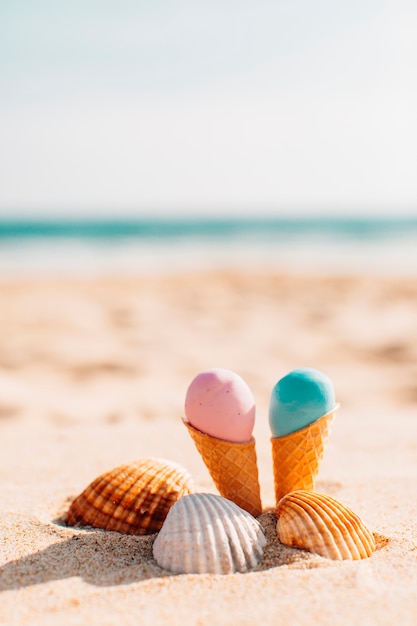 Ice creams with shells in the beach