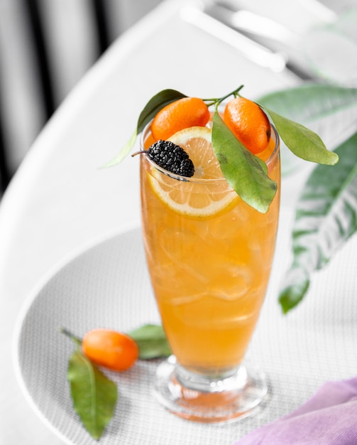 iced cocktail with citruces on the table