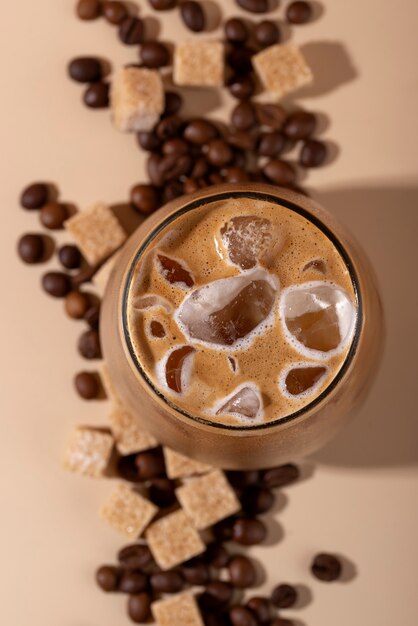 Iced coffee and sugar cubes  top view