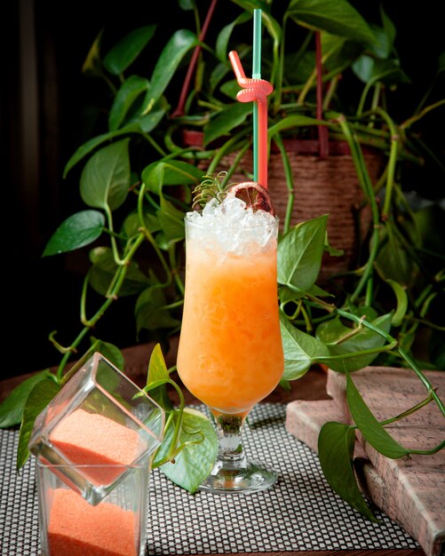 Iced orange cocktail on the table