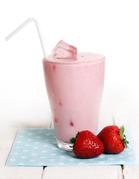 Iced pink cocktail and fresh strawberries