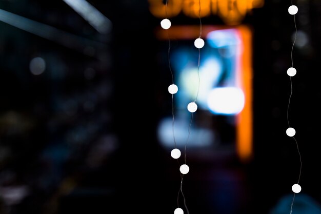 An illuminated fairy lights against blurred backdrop