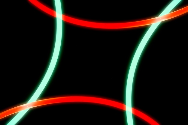 Free photo illuminated red and green curve lights on black background