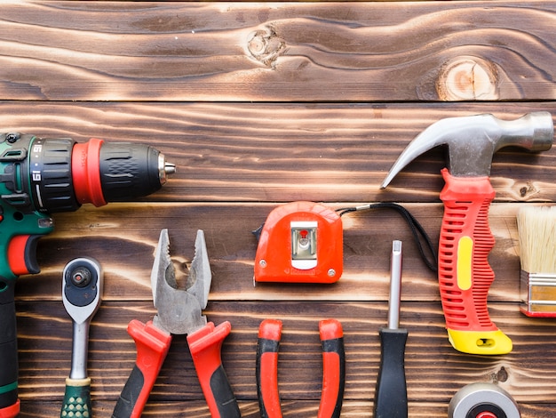 Free photo implements of carpenter on wooden table