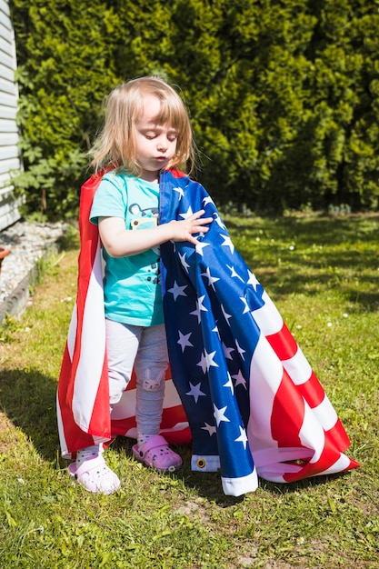 Free Photo independence day concept with girl in garden