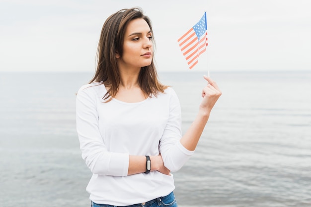 Independence day concept with woman at the sea