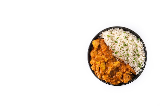 Free Photo indian butter chicken in black bowl isolated on white background