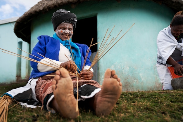 Free photo indigenous person doing daily chores and showcasing lifestyle