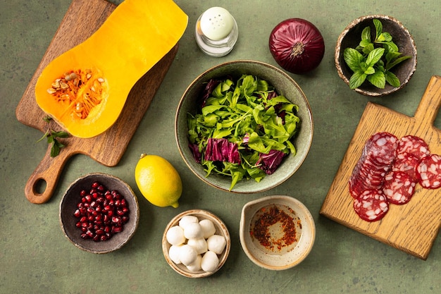 Ingredients for baked pumpkin salad chorizo and mozzarella The concept of healthy eating