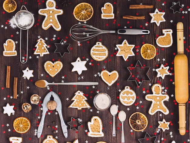 Ingredients and tools for baking christmas gingerbread cookies