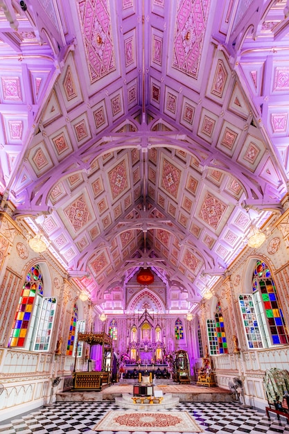 inside church with beautiful ceiling in Thailand