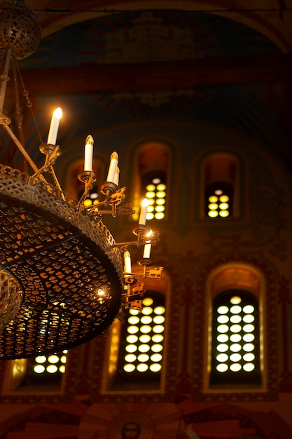 Free Photo inside view of church candelabra with candles