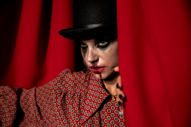 Intense shot of a halloween make-up woman looking away