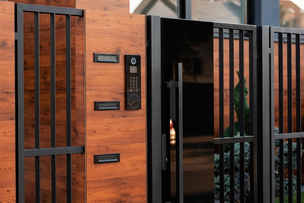 Intercom on a gate in front of residential building