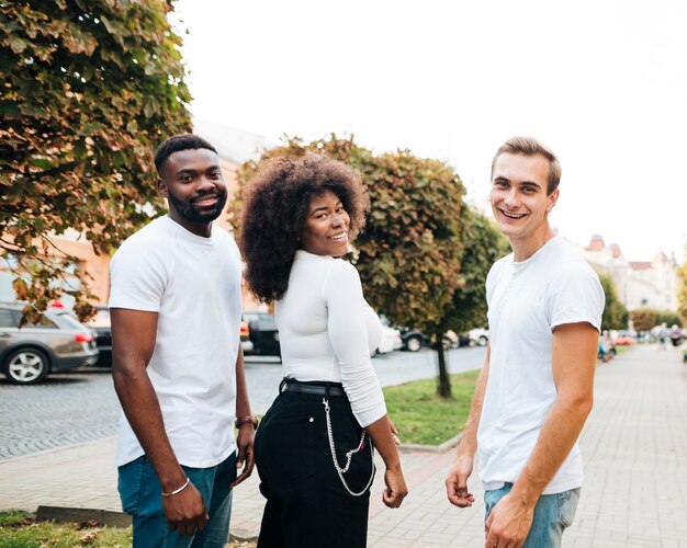 Intercultural friends walking together