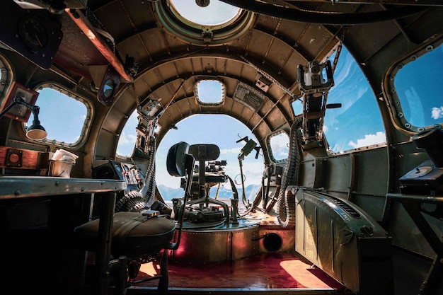 Free photo interior of a b-17 bomber plane from wwii in an airbase