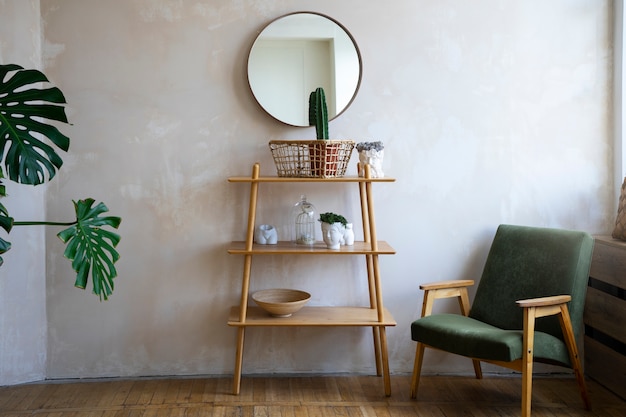 Free photo interior decor with mirror and potted plant