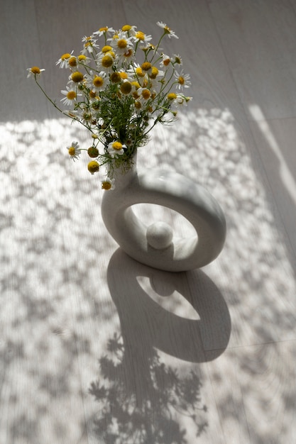 Free Photo interior design with flowers high angle