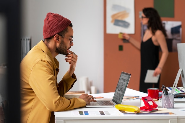 Free photo interior designer working out of the office