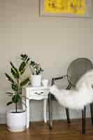 Free photo interior room decor with potted plants