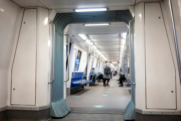 Free photo interior of a subway with illuminationnd few people inside