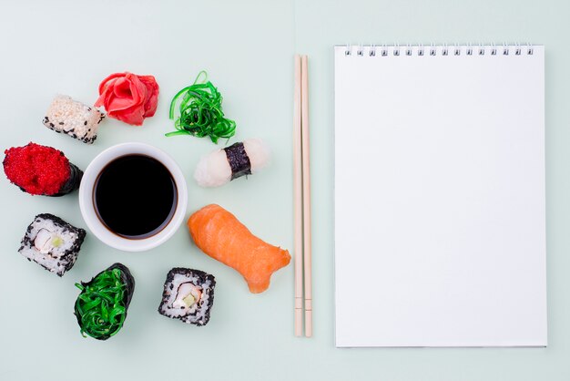 International sushi day celebration with notebook