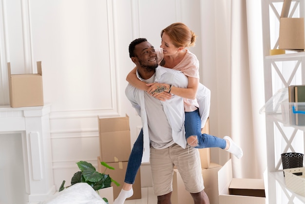 Interracial couple getting ready to move