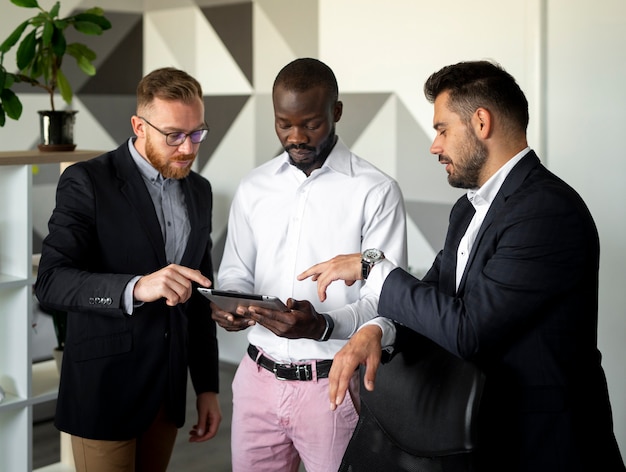 Free photo interracial employees in medium shot