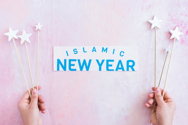 Islamic New Year and hands with stars