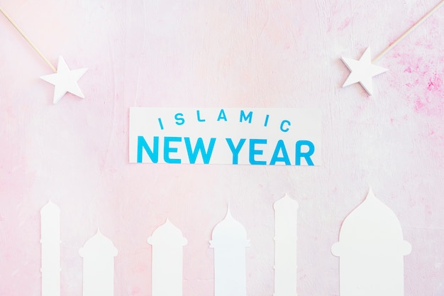 Free Photo islamic new year with mosque and stars on pink