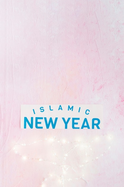 Free Photo islamic new year word and lighting fairy lights 