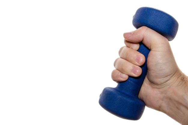 Free photo isolated picture of a person holding a small blue dumbbell