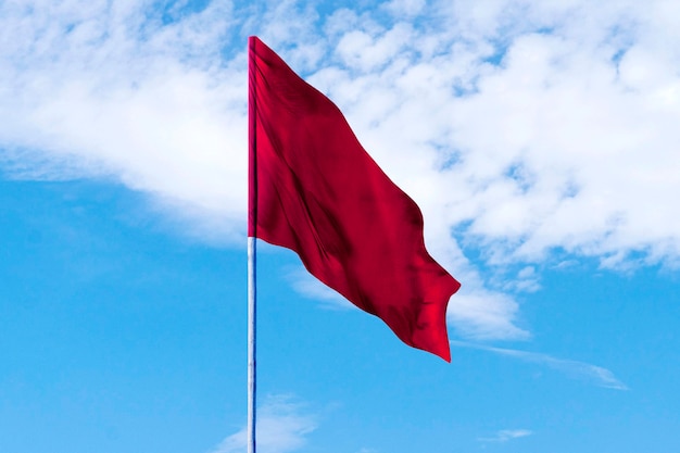 Isolated red flag in nature