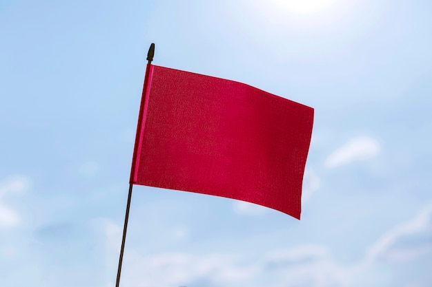 Isolated red flag in nature