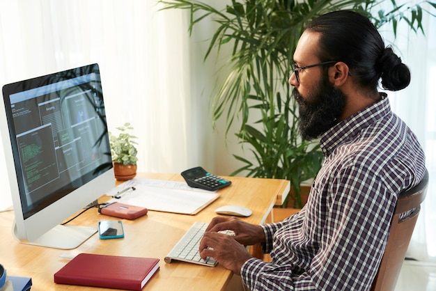 IT engineer working with his PC