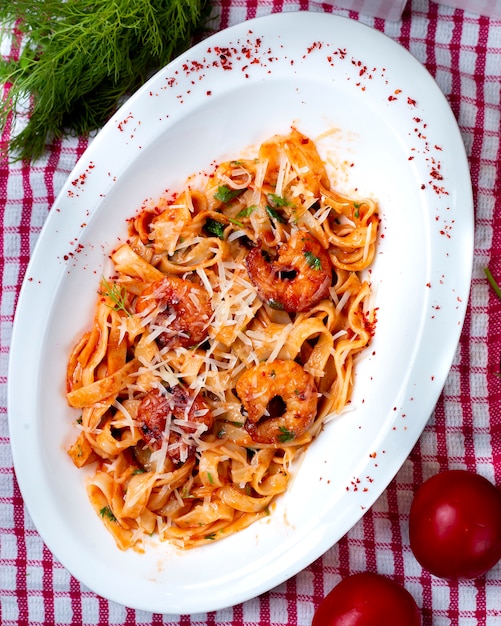 Italian Pasta in tomato sauce with chopped parmesan.