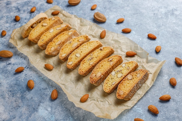 Italian tuscan traditional cookies cantuccini with almonds on grey concrete table