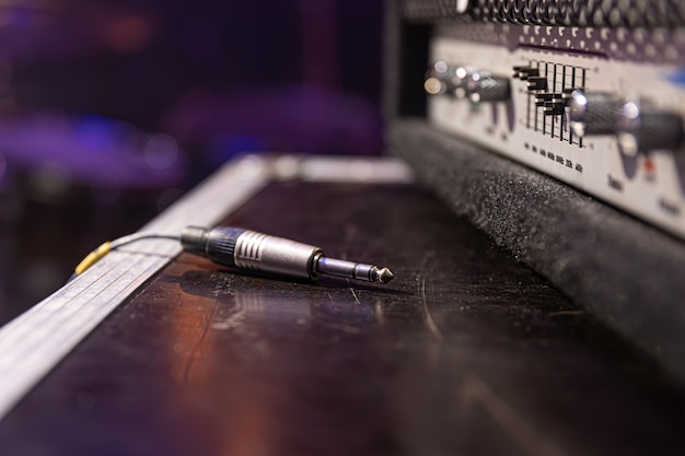 Free photo jack audio connector being plugged into a socket on an audio device for music, audio.