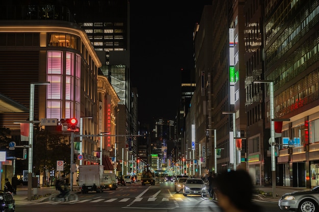 Japan city at night with people on street