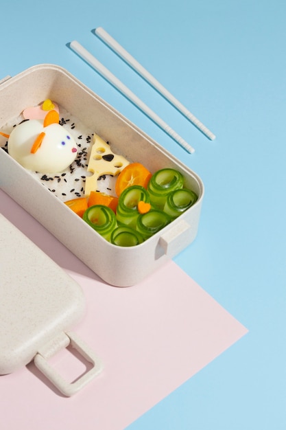 Free photo japanese bento box arrangement