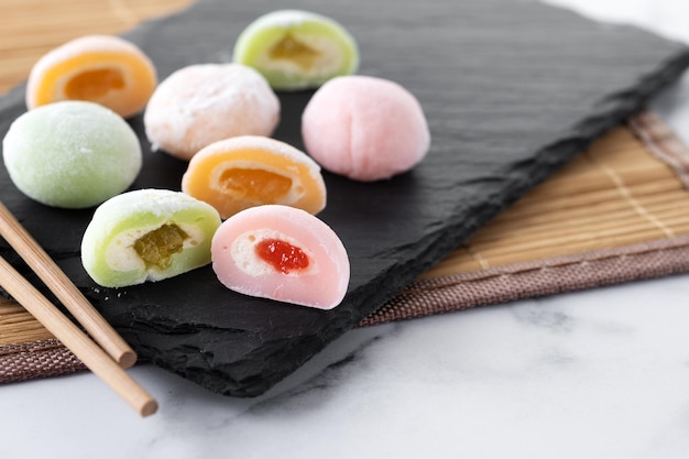 Japanese colorful mochi on marble background