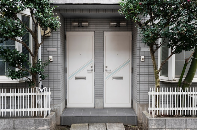 Free photo japanese house entrance and trees