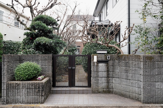 Free photo japanese house entrance with nature