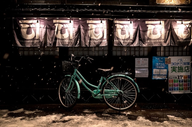 Free photo japanese street food place and bicycle