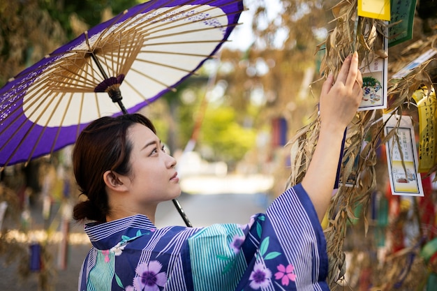 Japanese wagasa umbrella help by young woman