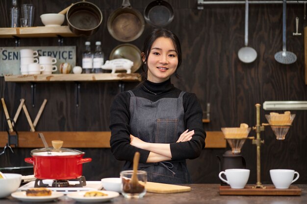 Japanese woman posing in a restaurant