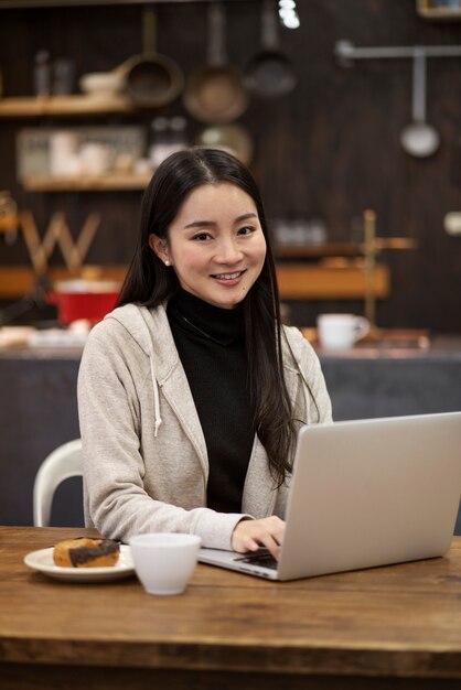 Japanese woman posing in a restaurant