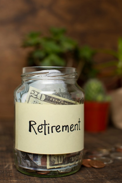 Jar filled with money and retirement label